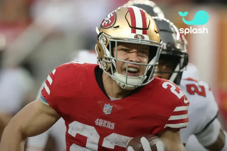 49ers player breaks away from defenders with fierce determination in NFL.